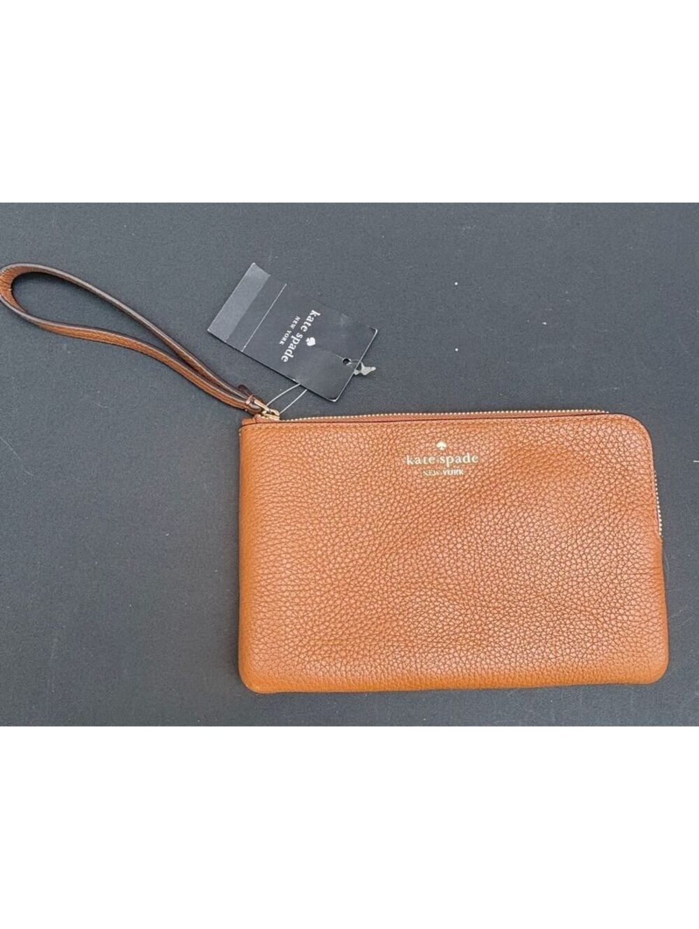 Kate Spade	NWT warm ginger pebble leather wristlet KB684